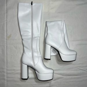 White knee-high leather heeled platform boots